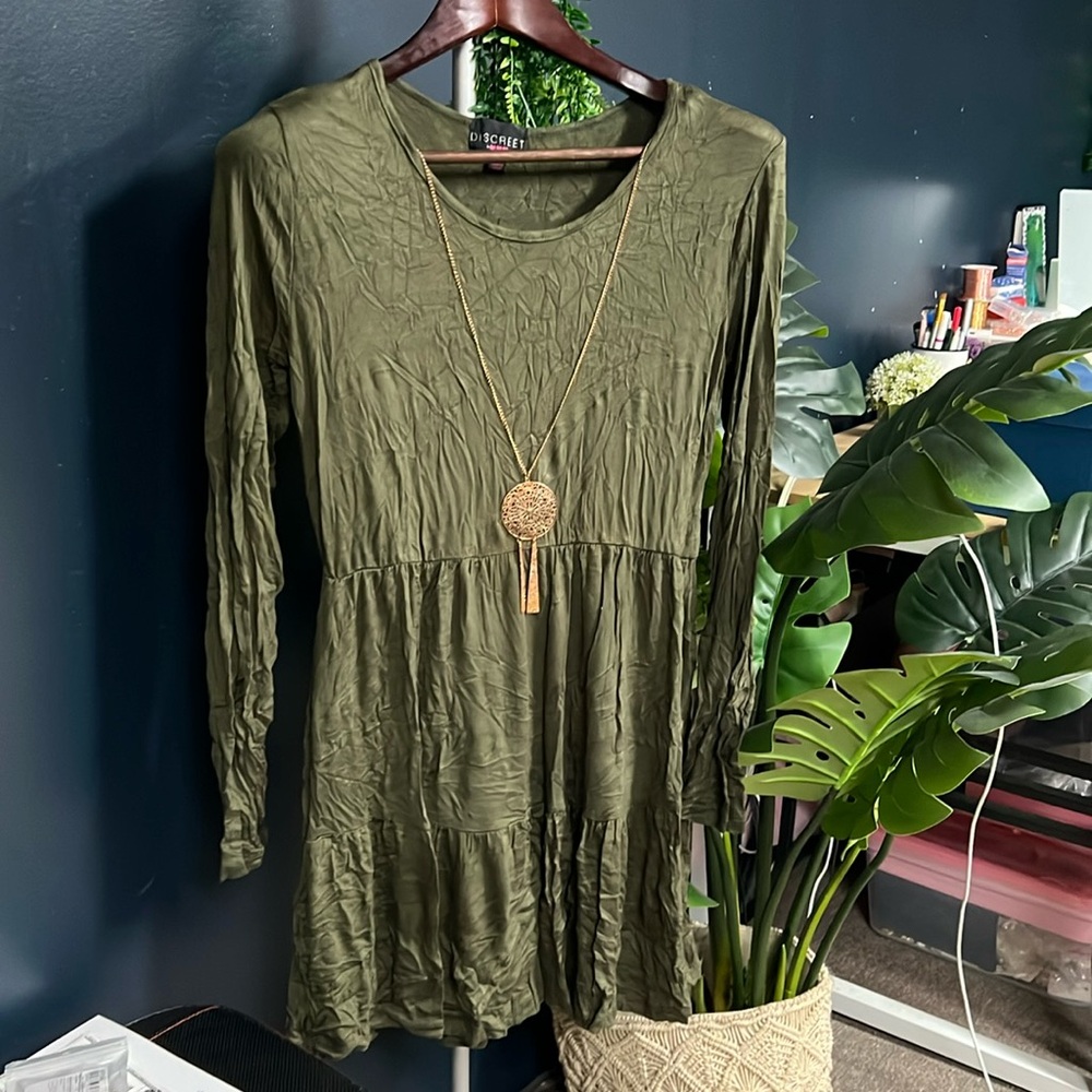 Green dress with necklace